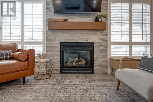 1159 Barclay Circle, Milton, ON - Indoor Photo Showing Living Room With Fireplace