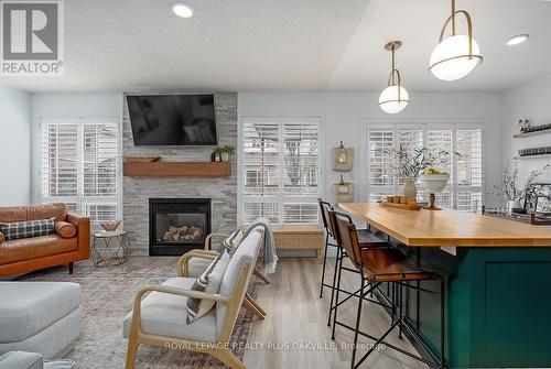 1159 Barclay Circle, Milton, ON - Indoor With Fireplace