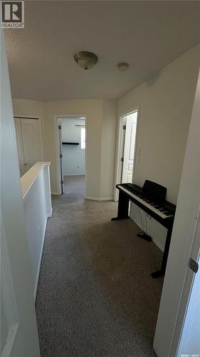 13 1437 1St Street, Estevan, SK - Indoor Photo Showing Other Room