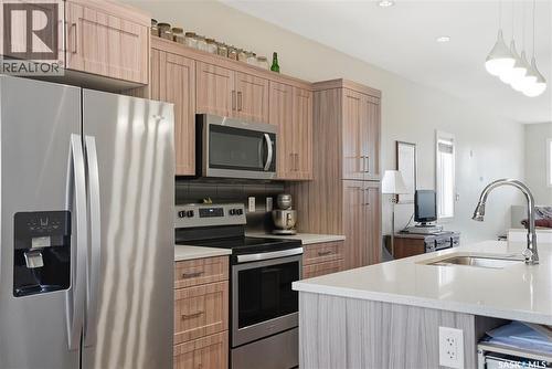 1407 Hughes Drive, Saskatoon, SK - Indoor Photo Showing Kitchen With Double Sink With Upgraded Kitchen