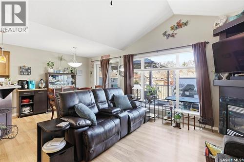 2827 Meadow Park Crescent E, Regina, SK - Indoor Photo Showing Living Room With Fireplace