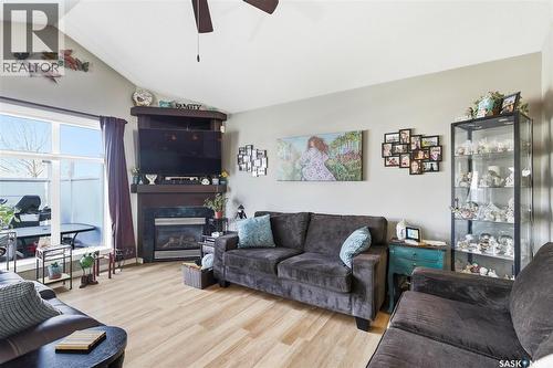 2827 Meadow Park Crescent E, Regina, SK - Indoor Photo Showing Living Room With Fireplace
