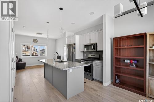 3136 Crosbie Crescent, Regina, SK - Indoor Photo Showing Kitchen With Stainless Steel Kitchen With Upgraded Kitchen
