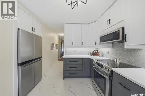203 Gustin Crescent, Saskatoon, SK - Indoor Photo Showing Kitchen With Upgraded Kitchen
