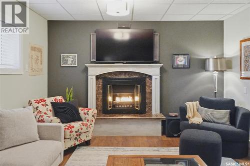 203 Gustin Crescent, Saskatoon, SK - Indoor Photo Showing Living Room With Fireplace
