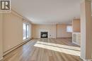 1003 510 5Th Avenue N, Saskatoon, SK  - Indoor Photo Showing Living Room With Fireplace 