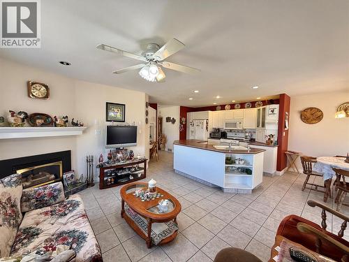 11900 Olympic View, Osoyoos, BC - Indoor Photo Showing Living Room With Fireplace