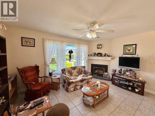 11900 Olympic View, Osoyoos, BC - Indoor Photo Showing Living Room With Fireplace