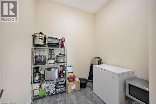 Light-toned walls complement the gray tile flooring in this room - 6 Dorothys Drive, Oro-Medonte, ON - Indoor Photo Showing Laundry Room