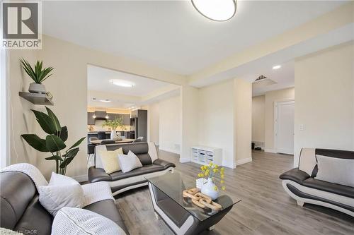 Spacious living area featuring wood-finish flooring, light-toned walls, and recessed lighting - 6 Dorothys Drive, Oro-Medonte, ON - Indoor Photo Showing Living Room
