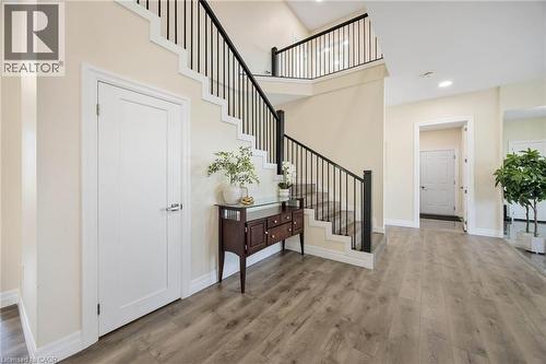Two-story staircase with dark metal balusters and white risers - 6 Dorothys Drive, Oro-Medonte, ON - Indoor Photo Showing Other Room