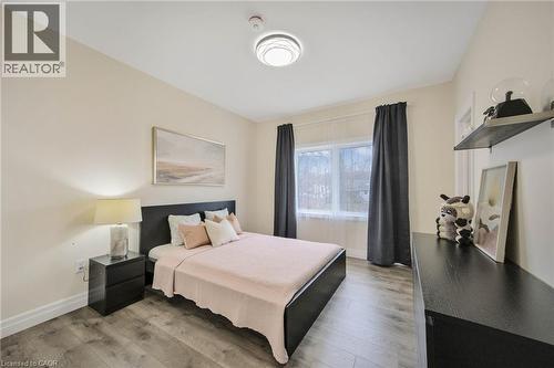 Bedroom featuring light-toned walls and wood-finish flooring - 6 Dorothys Drive, Oro-Medonte, ON - Indoor Photo Showing Bedroom