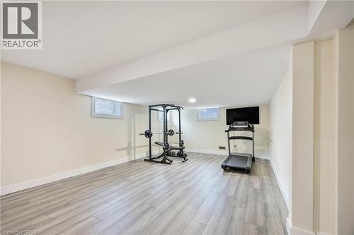 Spacious room featuring light wood-finish flooring, recessed lighting, and bright white baseboards - 6 Dorothys Drive, Oro-Medonte, ON - Indoor