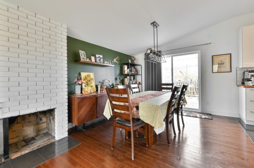 Salle à manger - 385 Av. Victor-Hugo, Brossard, QC - Indoor Photo Showing Dining Room With Fireplace