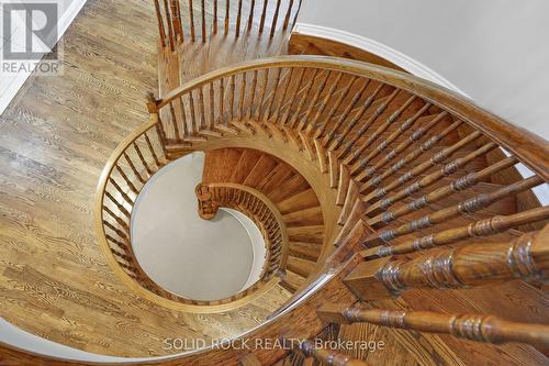 Spiral hardwood staircase runs from top to bottom - 45 Basswood Avenue, Ottawa, ON - Indoor Photo Showing Other Room