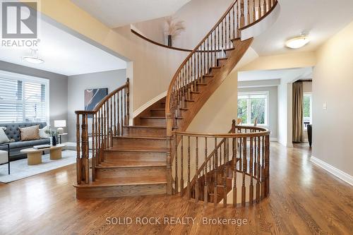 Grand spiral staircase (hardwood) - 45 Basswood Avenue, Ottawa, ON - Indoor Photo Showing Other Room
