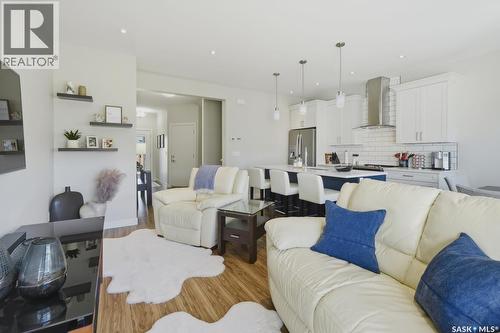 27 619 Evergreen Boulevard, Saskatoon, SK - Indoor Photo Showing Living Room