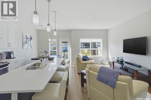27 619 Evergreen Boulevard, Saskatoon, SK - Indoor Photo Showing Kitchen With Double Sink