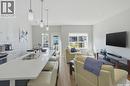 27 619 Evergreen Boulevard, Saskatoon, SK  - Indoor Photo Showing Kitchen With Double Sink 
