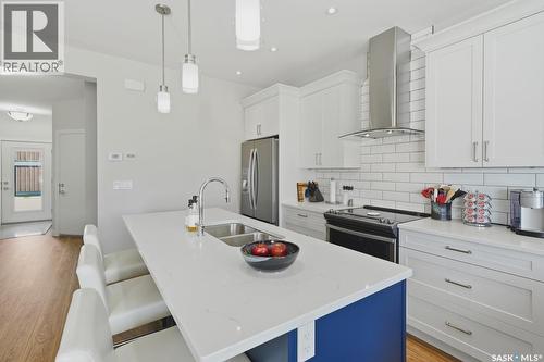 27 619 Evergreen Boulevard, Saskatoon, SK - Indoor Photo Showing Kitchen With Double Sink With Upgraded Kitchen