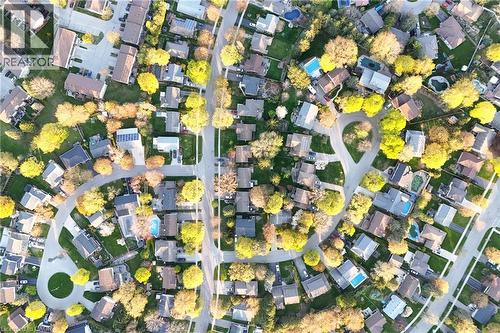 Aerial perspective of a residential community with mature trees - 183 Harvard Road, Waterloo, ON - 