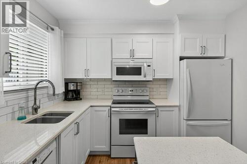 4 Camelot Drive, Hamilton, ON - Indoor Photo Showing Kitchen With Double Sink