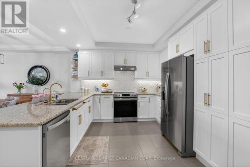 208 - 260 Villagewalk Boulevard, London North (North R), ON - Indoor Photo Showing Kitchen With Double Sink With Upgraded Kitchen