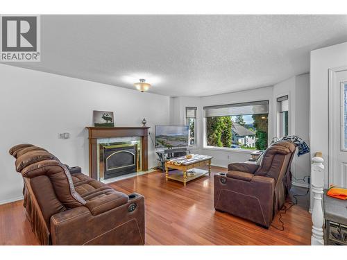 6765 Checkley Road, Prince George, BC - Indoor Photo Showing Living Room With Fireplace