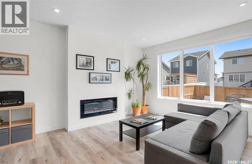 314 Keith Union, Saskatoon, SK - Indoor Photo Showing Living Room With Fireplace
