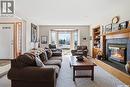 403 Willow Bay, Balgonie, SK  - Indoor Photo Showing Living Room With Fireplace 