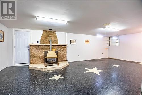 4214 Roy, Hanmer, ON - Indoor Photo Showing Other Room With Fireplace