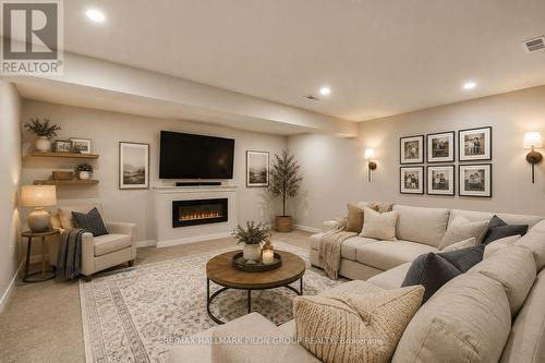 819 Tewin Circle, Ottawa, ON - Indoor Photo Showing Living Room With Fireplace