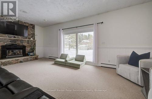 Family room - 33 Tower Road, Arran-Elderslie, ON - Indoor Photo Showing Living Room With Fireplace
