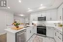 313 - 1560 Upper West Avenue, London South (South B), ON  - Indoor Photo Showing Kitchen With Double Sink With Upgraded Kitchen 