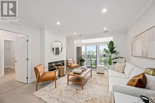 313 - 1560 Upper West Avenue, London South (South B), ON - Indoor Photo Showing Living Room With Fireplace