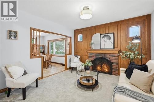 507 Queensdale Avenue E, Hamilton, ON - Indoor Photo Showing Living Room With Fireplace