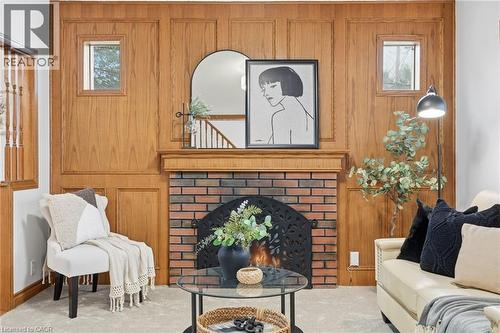 507 Queensdale Avenue E, Hamilton, ON - Indoor Photo Showing Living Room With Fireplace