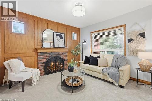 507 Queensdale Avenue E, Hamilton, ON - Indoor Photo Showing Living Room With Fireplace