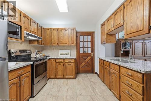 507 Queensdale Avenue E, Hamilton, ON - Indoor Photo Showing Kitchen With Double Sink