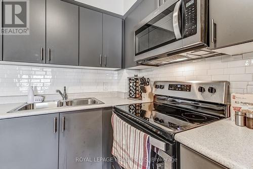 708 - 716 Main Street E, Milton, ON - Indoor Photo Showing Kitchen With Double Sink