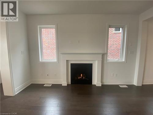 67 Histand Trail Unit# Upper, Kitchener, ON - Indoor Photo Showing Living Room With Fireplace