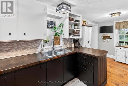 311 Burridge Road, Frontenac (Frontenac South), ON - Indoor Photo Showing Kitchen With Double Sink