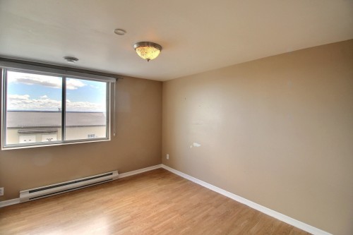 Chambre à coucher - 150 Rue Du Quai, La Malbaie, QC - Indoor Photo Showing Other Room