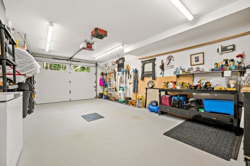 Garage - 115 Allée Des Weskarinis, Mont-Tremblant, QC - Indoor Photo Showing Garage