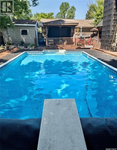 182 Lincoln Drive, Regina, SK - Outdoor With In Ground Pool With Deck Patio Veranda With Backyard
