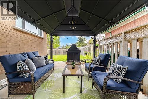 Covered patio space featuring a dark metal gazebo - 1376 Royal Drive, Burlington, ON - Outdoor With Deck Patio Veranda With Exterior