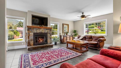 3609 Masuch Road, Creston, BC - Indoor Photo Showing Living Room With Fireplace
