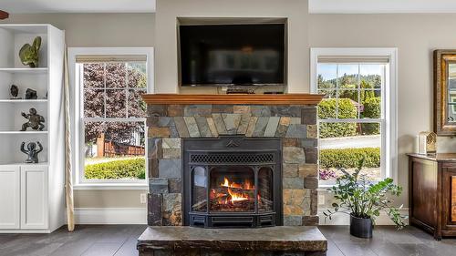 3609 Masuch Road, Creston, BC - Indoor Photo Showing Living Room With Fireplace