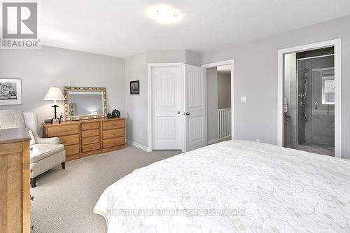 with walk in closet - 54 Conservation Way, Collingwood, ON - Indoor Photo Showing Bedroom