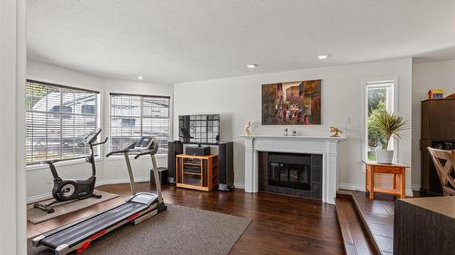 3418 Mariposa Court, Kelowna, BC - Indoor Photo Showing Living Room With Fireplace
